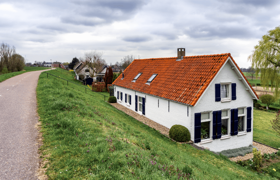 What Is a Mansard Roof? Types, Design & Cost Explained